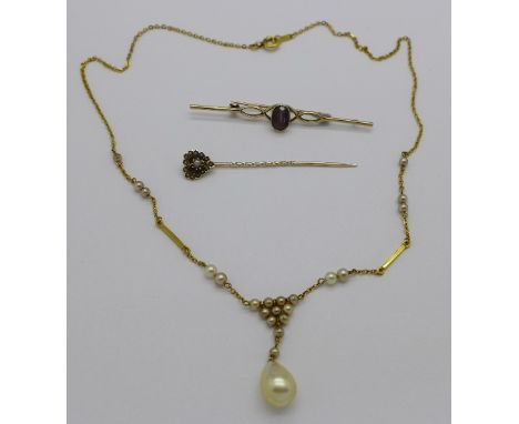A 9ct gold and pearl necklet, a 9ct gold pin and a 9ct gold brooch, total weight 7.1g