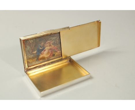 A CONTINENTAL SILVER CIGARETTE CASE with engine turned decoration, the interior of the lid revealing an erotic miniature pain