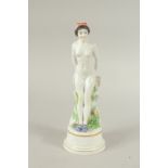A MEISSEN FIGURE OF A STANDING WOMAN RESTING ON A FENCE. A circle of geese around the base. Modelled