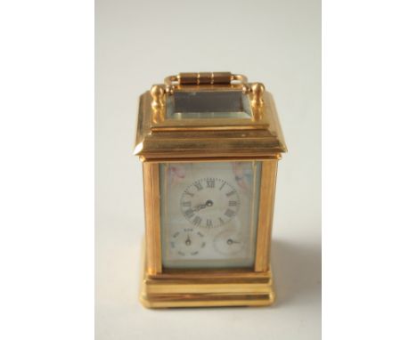 A SEVRES MODEL MULTI-DIAL CARRIAGE CLOCK with porcelain panels.