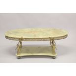 A GOOD ONYX AND GILT METAL OVAL COFFEE TABLE with classical supports and under tier. 4ft long x