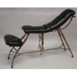 Christian Maas, in the manner of Mark Brazier - Jones, a wrought iron and button upholstered black