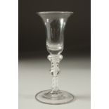 A GEORGIAN WINE GLASS with white opaque twist stem and single knop. 6ins high.