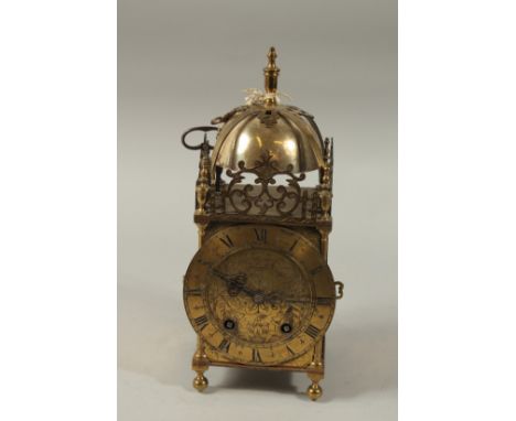 A GOOD BRASS LANTERN CLOCK by F. H. PRATT, DERBY. 13ins high.