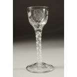 A GEORGIAN WINE GLASS, the bowl engraved with roses and opaque twist stem. 5.75ins high.