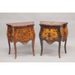 A PAIR OF LOUIS XVITH DESIGN INLAID BOMBE FRONTED COMMODES, each with two drawers, on curving