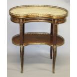 A LOUIS XVITH STYLE KIDNEY SHAPED TWO TIER TABLE with ormolu mounts.