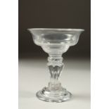 A GEORGIAN CHAMPAGNE GLASS with large bowl and fluted stem. 5ins high.