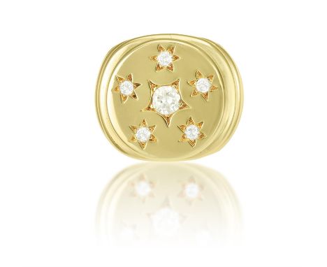 A DIAMOND DRESS RINGThe circular plaque set with brilliant-cut diamonds each within star motif detailing, to a reeded mount, 