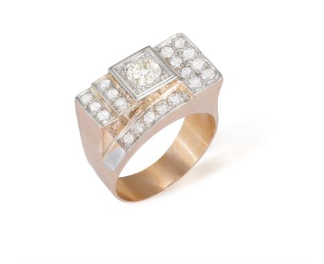 A DIAMOND TANK  RING, CIRCA 1940The geometric stepped design set with a central old cushion-shaped diamond within a surround 