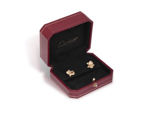 A PAIR OF DIAMOND 'CARESSE D'ORCHIDÉES' EARRINGS, BY CARTIER, 2008Each orchid flowerhead with polished gold petals centring a