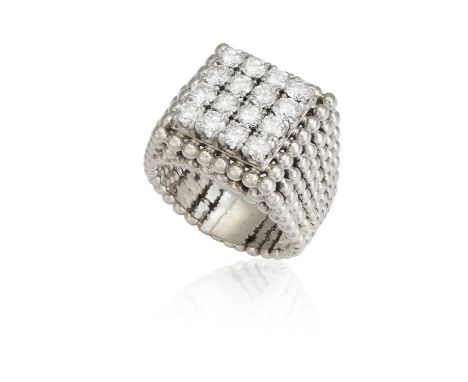 A DIAMOND RINGThe square frontispiece set with a series of brilliant-cut diamonds, with beading and textured gold mount, moun