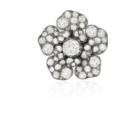 A LATE 19TH CENTURY DIAMOND BROOCH, REMODELLED AS A DRESS RINGDesigned as a flowerhead set throughout with old brilliant and 