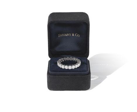 A DIAMOND 'FOREVER' ETERNITY RING, BY TIFFANY & CO.The full circle set with brilliant-cut diamonds within claw-setting, mount