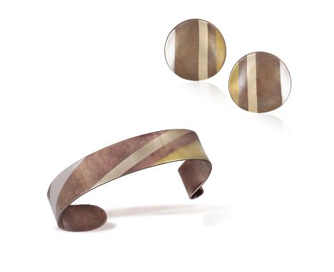 A BANGLE AND PAIR OF EARCLIPS, BY ANGELA CUMMINGS, FOR TIFFANY & CO. 1978The bangle with diagonally striped pattern and scrol
