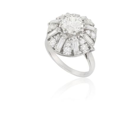 A DIAMOND CLUSTER RING, CIRCA 1960The central old European-cut diamond weighing approximately 1.20cts within a brilliant and 