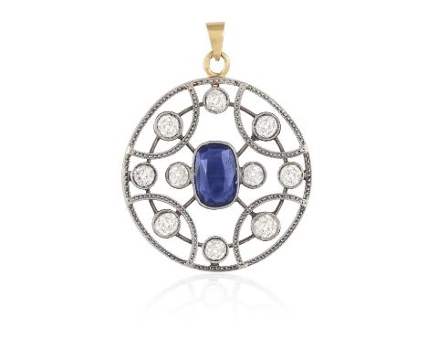 AN EARLY 20TH CENTURY SAPPHIRE AND DIAMOND PENDANTOf circular openwork design, the central cushion-shaped sapphire within a q