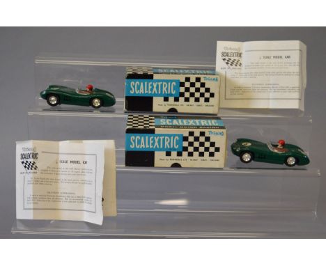 Slot Cars. Two boxed Tri-ang Scalextric MM/C.57 Aston Martin slot cars, both in green, one with RN '5' the other with RN '3'.