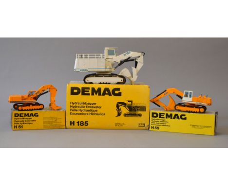 Three NZG Demag 1:50 scale diecast models: 113 Hydraulic Excavator H51; 273 Hydraulic Excavator H55; 241 Hydraulic Excavator 