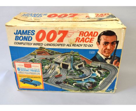 James Bond 007. A boxed Sears 'James Bond 007 Road Race' Set containing six moulded scenic sections of track, two mountain se