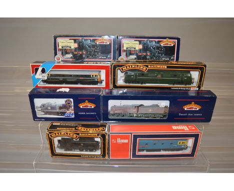OO Gauge. Eight boxed OO gauge model railway Locomotives by Hornby, Lima, Bachmann and Mainline including Bachmann 31-450A Iv