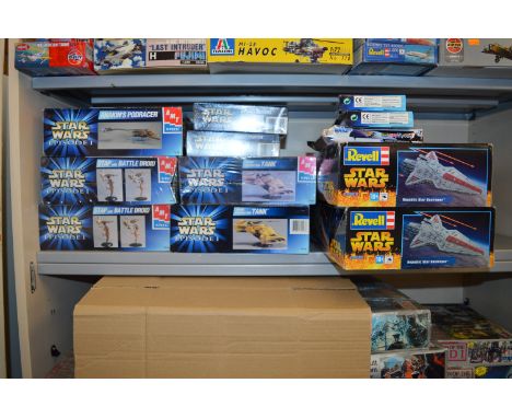 12 x Star Wars plastic model kits by AMT and Revell, includes: Republic Star Destroyer; Anakin's Pod Racer; STAP with Battle 