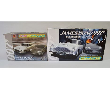 James Bond 007. Two boxed  Scalextric James Bond slot car racing sets, C1254 'Goldfinger and Casino Royale' in 1:32 scale, se