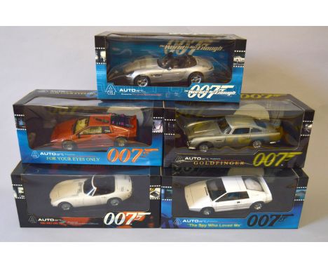 James Bond 007. Five boxed AUTOart James Bond related 1:18 scale model cars including  Aston Martin DB5, Toyota 2000GT, BMW Z