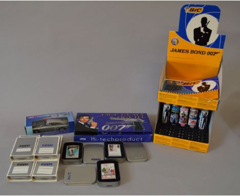 James Bond 007. Assorted James Bond lighters: Bic James Bond shop display box containing 25 lighters; nine Zippo lighters in 