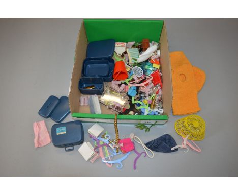 A quantity of loose vintage accessories for Pedigree 'Sindy' dolls together a few 'home made' items.