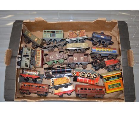 O Gauge. A small quantity of unboxed Hornby O Gauge Rolling Stock together with other tinplate railway items by Brimtoy and M