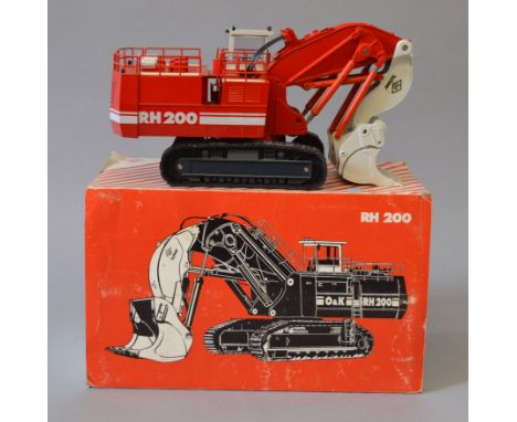 Auto Russia O&K RH 200 Hydraulic Excavator in red, 1:50 scale diecast model. VG, some very small paint chips, boxed.
