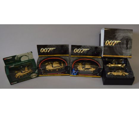 James Bond 007. Four boxed Corgi diecast James Bond related models with gold plated finish including Aston Martin DB5, models