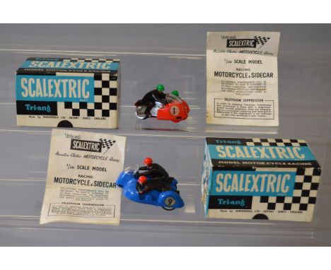 Slot Cars. Two boxed Tri-ang Scalextric MM/B1 Typhoon motor cycle and sidecar racing slots, one with RN '4' in blue, the othe