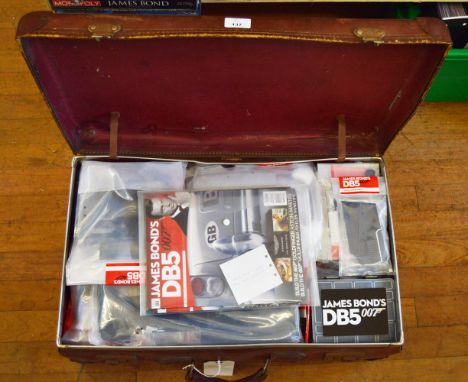 James Bond 007. A quantity of bagged parts, accompanying plans and magazines from the 'Build the James Bond Aston Martin DB5'