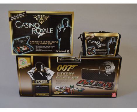 James Bond 007. Three Cartamundi Poker sets: 'Casino Royale' Exclusive James Bond Compact Poker Set; 'Casino Royale' Exclusiv