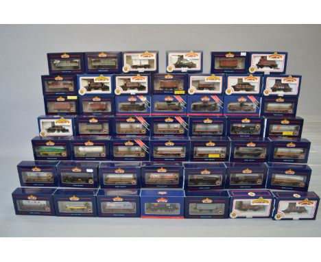 OO gauge. Bachmann, 48 x wagons: 27 x 45TAA Tank Wagons, including 18 limited editions; 21 x assorted BR wagons. E, boxed.