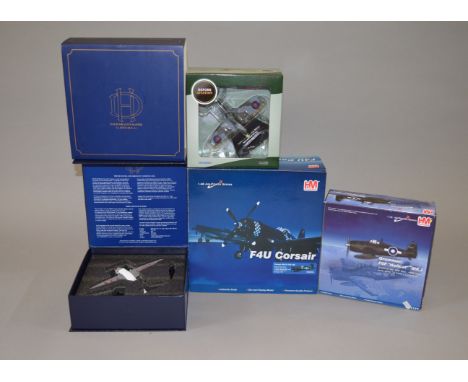 Four boxed diecast model aircraft, two by Hobby Master, HA1111 and HA8204 and two by Oxford,  a Spitfire and a BEA Dragon Rap