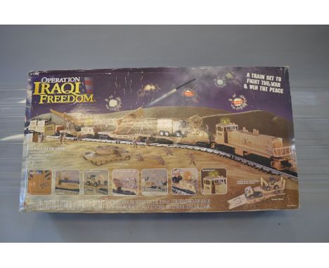 G Gauge. A boxed 'K Line' K-1308 'Operation Iraqi Freedom' train set. Overall appears G+ in G packaging.