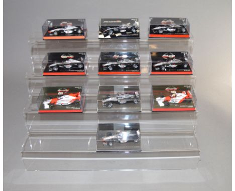 Ten boxed Minichamps diecast F1 Racing Car models in 1:43 scale, including McLaren MP 4/10 Mercedes M. Blundell and West McLa