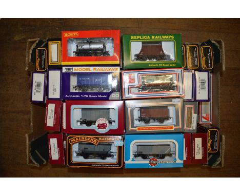 OO gauge. 48 x BR wagons: five Airfix/GMR; eight Mainline; 29 x Dapol; two Bachmann; one Replica; two Lima; one Hornby. Some 