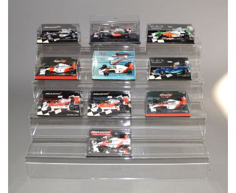 Ten boxed Minichamps diecast F1 Racing Car models in 1:43 scale, including McLaren MP 4/7 Honda V12 G. Berger 1992 and Red Bu