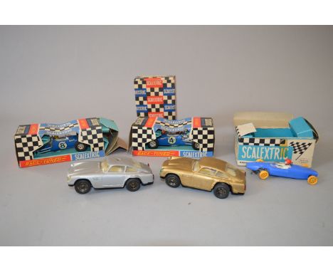 Three boxed vintage Scalextric slot cars, 2 x C14 Matra GP and a blue F.J. Lotus, the latter missing tyres together with two 