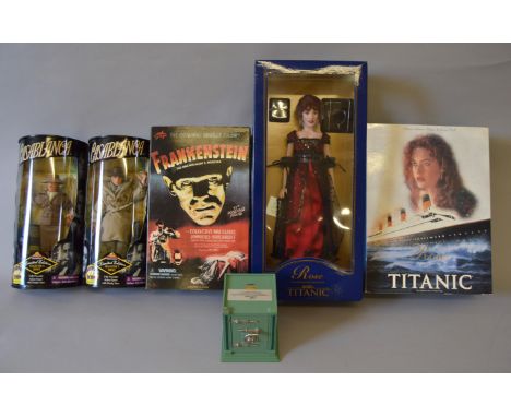 Five dolls and action figures: two Exclusive Premiere Collector's Series Hollywood Icons Casablanca figures, Rick Blaine and 