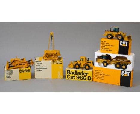 Five Caterpillar diecast construction models: Gescha CAT D9 Track-type Tractor; Gescha CAT 594 Pipelayer; NZG 237 Cat 966F Wh