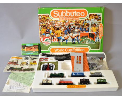 A mixed group of toys including a Hornby train set containing a GWR Tank Engine, six rolling stock items, track etc, in polys