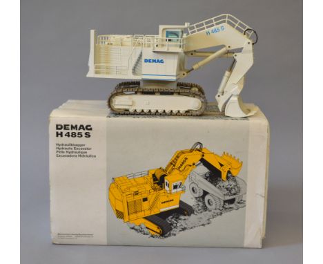 NZG 357 Demag H 485 S Hydraulic Excavator, white, 1:50 scale diecast model. VG with some small paint chips, in need of cleani