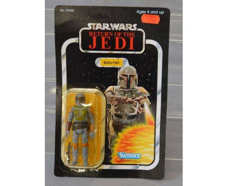 Kenner Star Wars Return of the Jedi Boba Fett 3 3/4" action figure sealed on a 65B back card. Figure is E on a G+ unpunched c