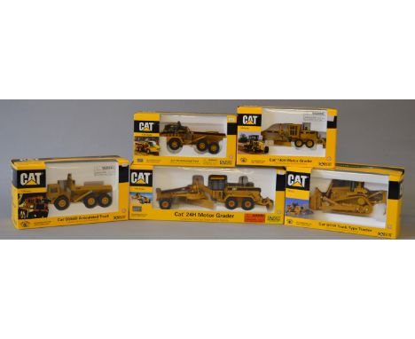Five Norscot Caterpillar diecast construction models: #55030 140H Motor Grader; #55025 D11R Track-type Tractor; #55700 D350D 