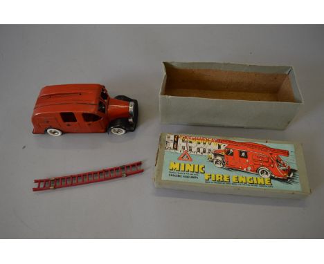 Triang Minic 62ME pre-war Fire Engine. Tinplate clockwork model with working electric lights is red with ladder and bell. G, 